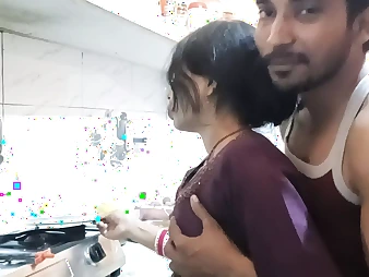 Hot Indian teen with big titties gets frisky in the kitchen with her boyfriend