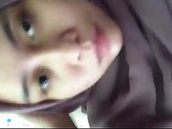 Mischievous Indonesian Jilbab Milks in hijab Solo